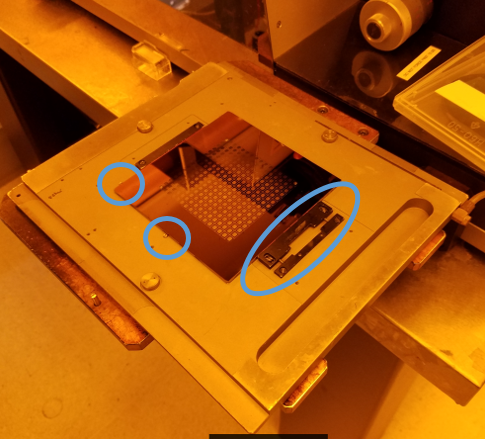 Press CHANGE MASK on the machine to engage the mask holder vacuum. The ...